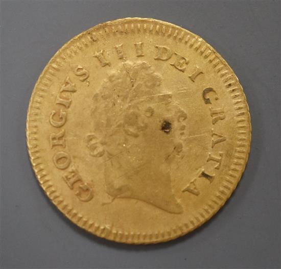 A George III 1803 third of a guinea.